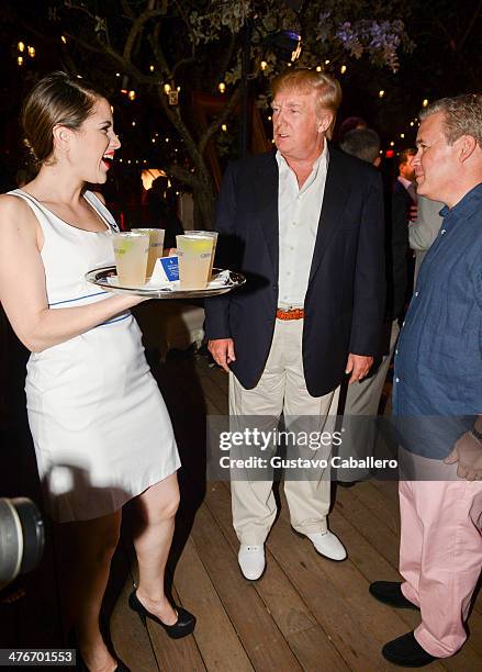 Donald Trump attends The Opening Drive Party at Hyde Beach on March 4, 2014 in Miami, Florida.