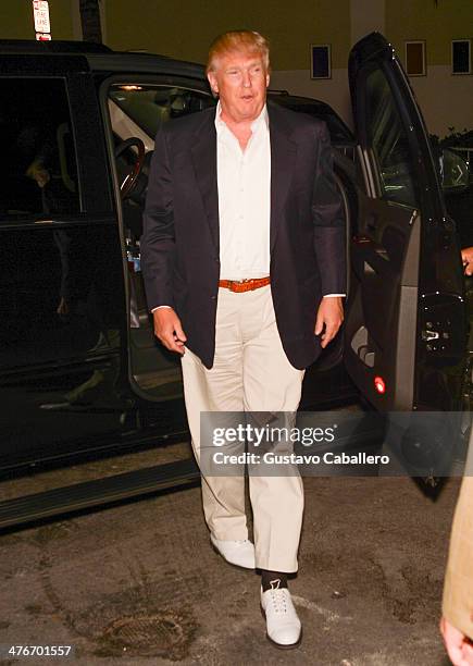 Donald Trump arrives to The Opening Drive Party at Hyde Beach on March 4, 2014 in Miami, Florida.