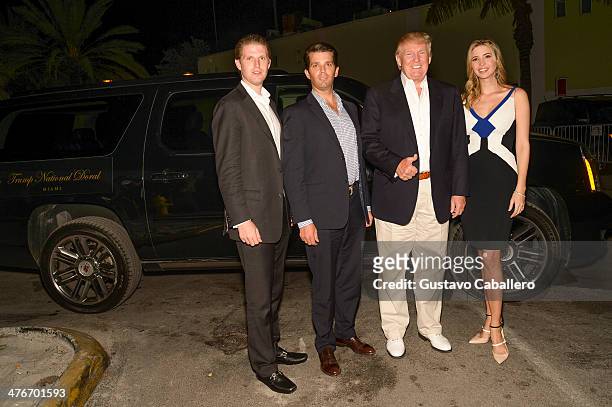 Eric Trump, Donald Trump, Jr., Donald Trump, and Ivanka Trump arrive to The Opening Drive Party at Hyde Beach on March 4, 2014 in Miami, Florida.