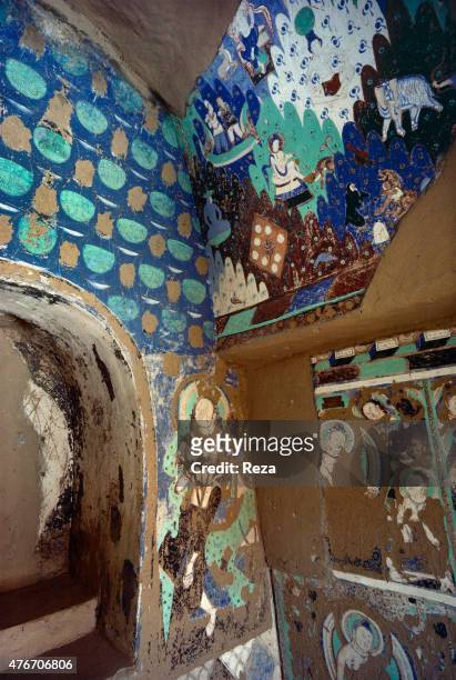 May Cave n°14, Kyzyl, Xinjiang, China. These paintings decorate cave n°14's right angle. On top of the cave's natural deterioration come the damages...