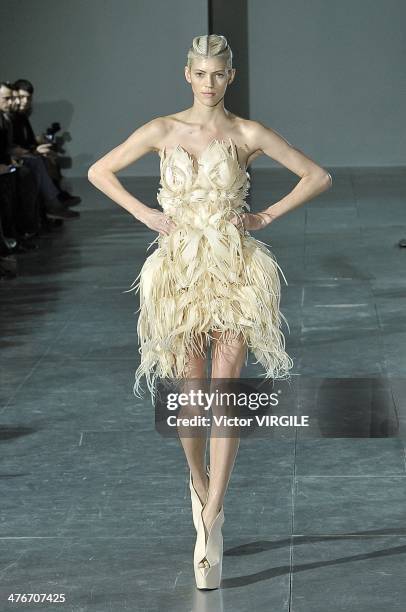 Model walks the runway during the Iris Van Herpen show as part of the Paris Fashion Week Womenswear Fall/Winter 2014-2015 on March 4, 2014 in Paris,...