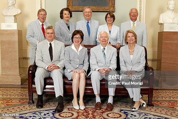 Dressed in Seersucker suits, Senators Bill Cassidy, Susan Collins, Thad Cochrane and Shelley Capito; John Isakson, Diane Feinstein, Mitch McConnnell,...