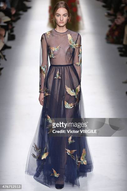 Model walks the runway during the Valentino show as part of the Paris Fashion Week Womenswear Fall/Winter 2014-2015 on March 4, 2014 in Paris, France.