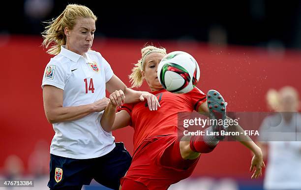 Ingrid Schjelderup of Norway challenges Lena Goessling of Germany during the FIFA Women's World Cup 2015 Group B match between Germany and Norway at...