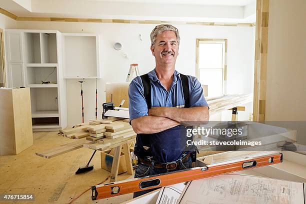 portrait of carpenter - home improvement contractor stock pictures, royalty-free photos & images