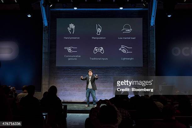 Palmer Luckey, co-founder of Oculus VR Inc. And creator of the Oculus Rift, displays the Oculus Touch controller while speaking during the "Step Into...
