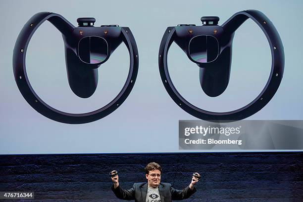 Palmer Luckey, co-founder of Oculus VR Inc. And creator of the Oculus Rift, displays the Oculus Touch controller while speaking during the "Step Into...