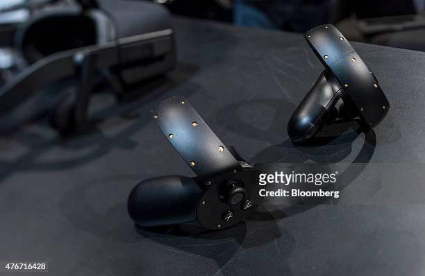 The Oculus VR Inc. Touch controller is displayed for a photograph during the "Step Into The Rift" event in San Francisco, California, U.S., on...