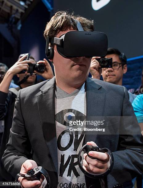 Palmer Luckey, co-founder of Oculus VR Inc. And creator of the Oculus Rift, demonstrates the new Oculus Rift headset during the "Step Into The Rift"...