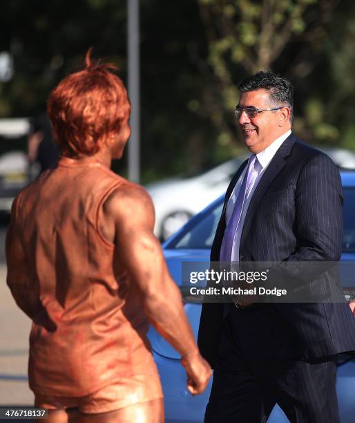Andrew Demetriou reacts when walking past a footballer painted up as a statue during the 2014 AFL Season Launch at Adelaide Oval on March 5, 2014 in...