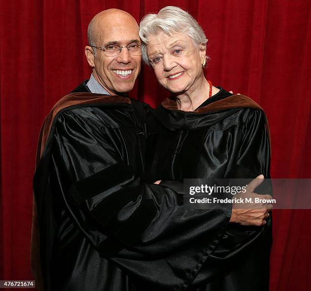 Producer Jeffrey Katzenberg presents actress Angela Lansbury with the Doctorate of Fine Arts degree from the American Film Institute during...