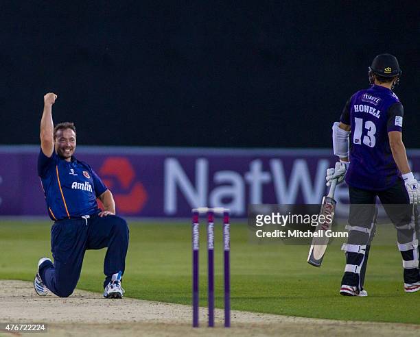 Graham Napier of Essex celebrates taking the wicket of Benny Howell of Gloucestershire during the NatWest T20 blast match between Essex Eagles and...