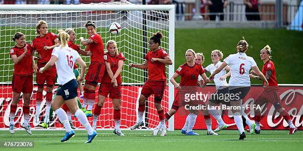 Maren Mjelde of Norway scores her teams first goal during the FIFA Women's World Cup 2015 Group B match between Germany and Norway at Lansdowne...