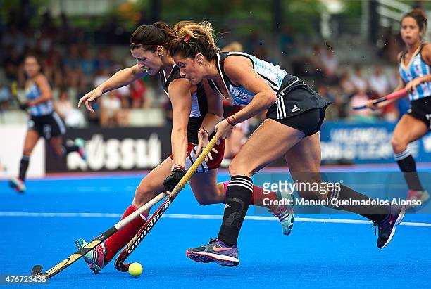 Agustina Albertario of Argentina competes for the ball with Kaelan Watson of Canada during the match between Argentina and Canada at Polideportivo...