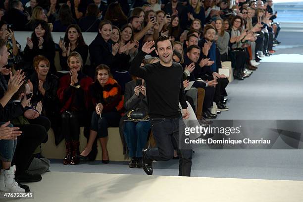 Creative Director Nicolas Ghesquiere appears at the end of the runway after the Louis Vuitton show as part of the Paris Fashion Week Womenswear...