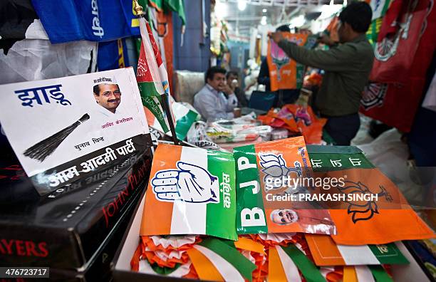 Various Indian national and regional political party flags and election campaign materials are seen for sale at a wholesale shop in New Delhi on...