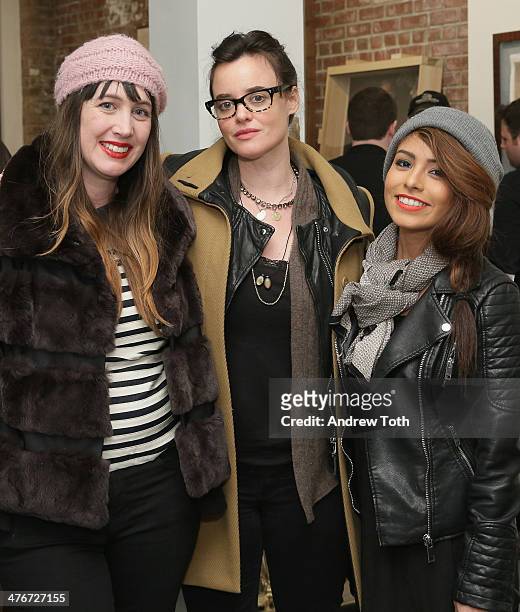 Adria Petty, Kelley Reynolds and Veronica Gutierrez attend Avant Gallery New York City preview opening event at Avant Gallery on March 4, 2014 in New...