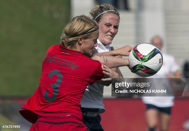 Germany's Saskia Bartusiak and Norway's Isabell Herlovsen fight for the ball during a Group B match at the 2015 FIFA Women's World Cup at Lansdowne...