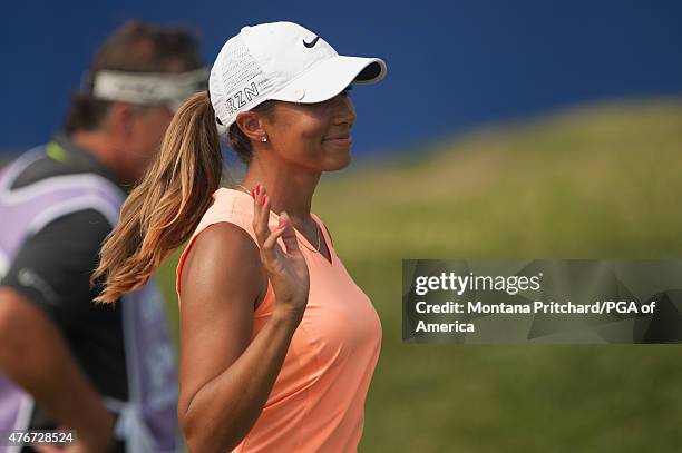 Cheyenne Woods of the United States waves to gallery during Round One of the 2015 KPMG Women's PGA Championship held at Westchester Country Club on...