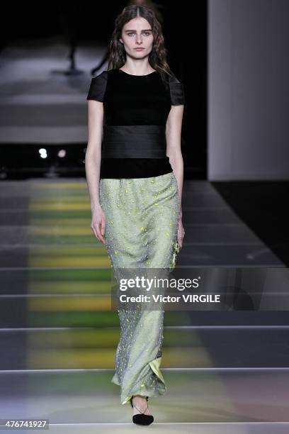 Model walks the runway during the Giorgio Armani as a part of Milan Fashion Week Womenswear Autumn/Winter 2014 on February 24, 2014 in Milan, Italy.