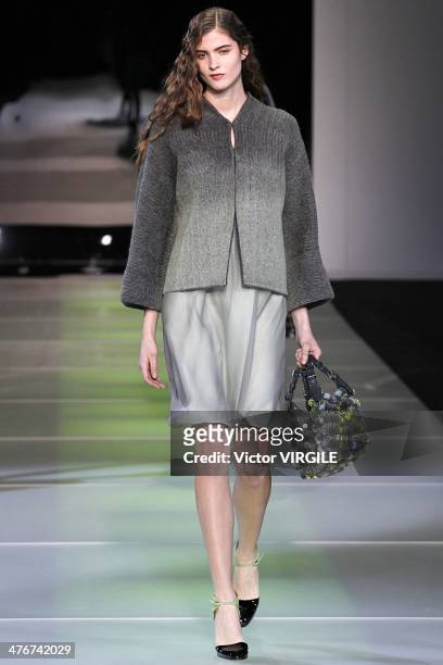 Model walks the runway during the Giorgio Armani as a part of Milan Fashion Week Womenswear Autumn/Winter 2014 on February 24, 2014 in Milan, Italy.