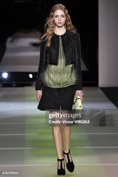 Model walks the runway during the Giorgio Armani as a part of Milan Fashion Week Womenswear Autumn/Winter 2014 on February 24, 2014 in Milan, Italy.