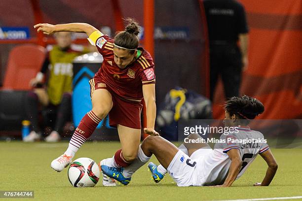 Diana Saenz of Costa Rica takes down Veronica Boquete of Spain during the 2015 FIFA Women's World Cup Group E match at Olympic Stadium on June 9,...