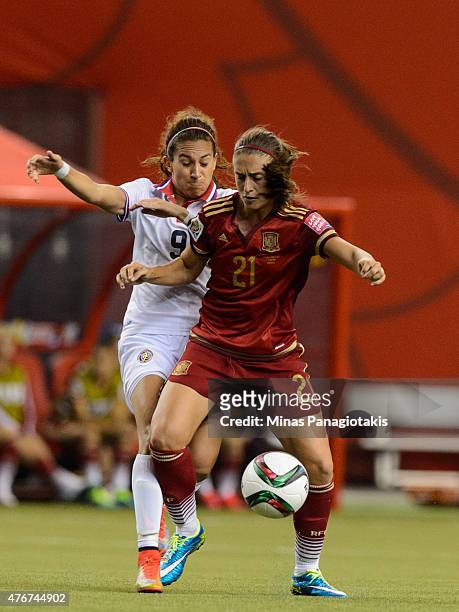 Alexia Putellas of Spain defends the ball against Carolina Venegas of Costa Rica during the 2015 FIFA Women's World Cup Group E match at Olympic...