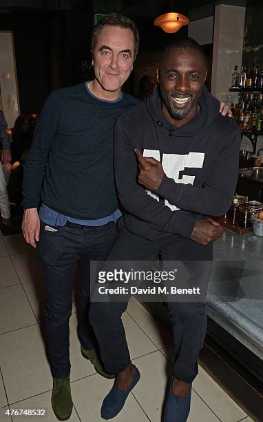 James Nesbitt and Idris Elba attend the official Idris Elba + Superdry presentation at LCM at Hix on June 11, 2015 in London, England.