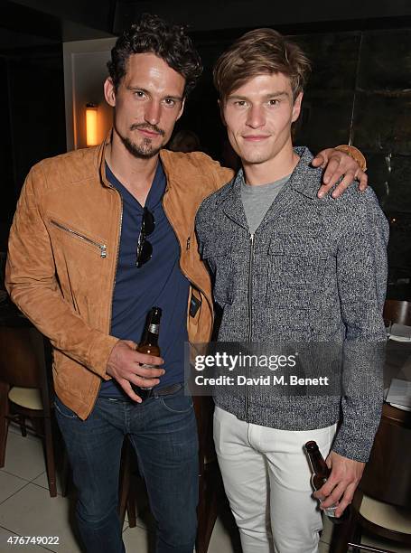 Sam Webb and Oliver Cheshire attend the official Idris Elba + Superdry presentation at LCM at Hix on June 11, 2015 in London, England.