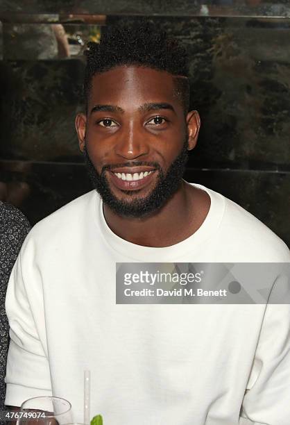 Tinie Tempah attends the official Idris Elba + Superdry presentation at LCM at Hix on June 11, 2015 in London, England.