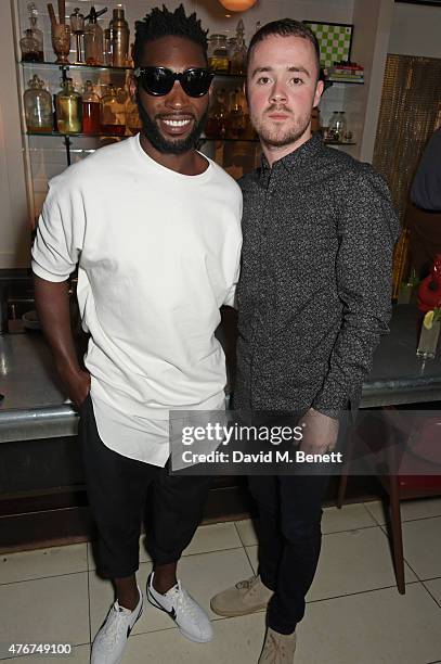 Tinie Tempah and Maverick Sabre attend the official Idris Elba + Superdry presentation at LCM at Hix on June 11, 2015 in London, England.