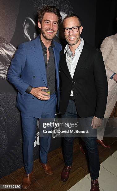 Robert Konjic and guest attend the official Idris Elba + Superdry presentation at LCM at Hix on June 11, 2015 in London, England.