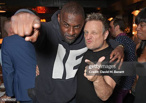 Idris Elba and Rankin attend the official Idris Elba + Superdry presentation at LCM at Hix on June 11, 2015 in London, England.