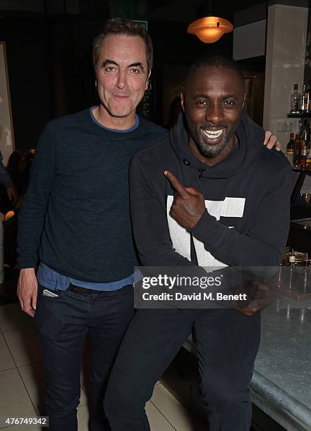 James Nesbitt and Idris Elba attend the official Idris Elba + Superdry presentation at LCM at Hix on June 11, 2015 in London, England.