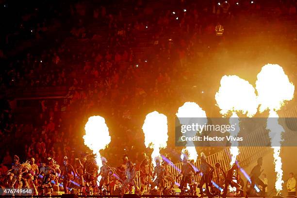 Dancers perform the hoko, a traditional dance from Eastern Island, during the Opening Ceremony of the 2015 Copa America Chile prior to the Group A...