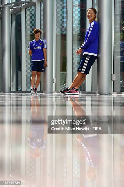 Sisters Yuki Ogimi and Asano Nagasato of Japan pose for a photo at the Sheraton Wall Centre on June 9, 2015 in Vancouver, Canada.