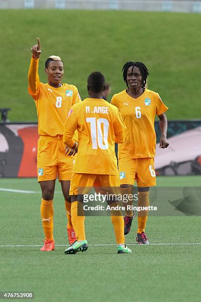 Ange N'Guessan of Cote d'Ivoire celebrate her goal with team mates Ines Nrehy and Rita Akaffou during the FIFA Women's World Cup Canada 2015 Group B...