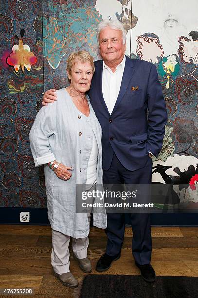 Dame Judi Dench poses with Sir Richard Eyre following an 'In Conversation' at The Hospital Club as part of the Mountview Academy's 70th birthday...