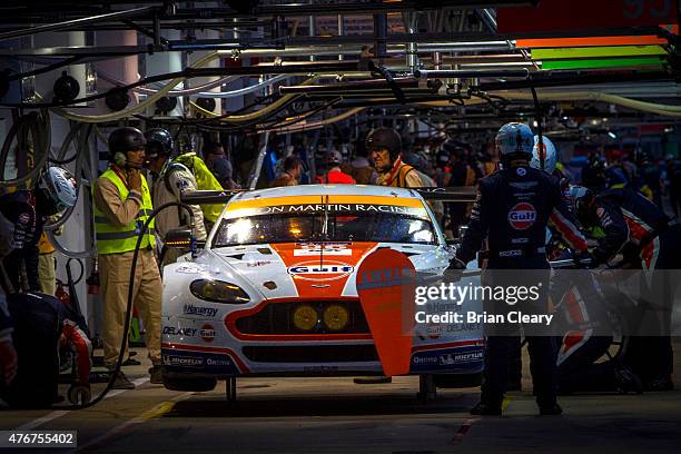 The Aston Martin Vantage V8 of Roald Goethe, Stuart Hall, and Francesco Castellacci makes a pit stop during qualifying for the 24 Hours of Le Mans on...