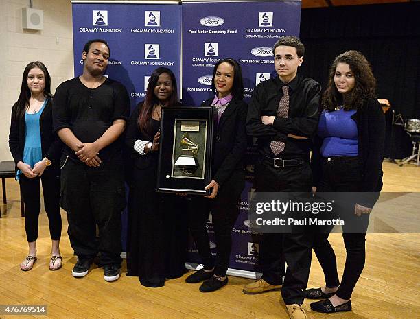 Kisha Cordero, Luis Restitryo, Miralys Santana, Adrieliz Ortiz, Giancarlo Castaneda, Selines Diaz and GRAMMY Foundation Exective Director of...