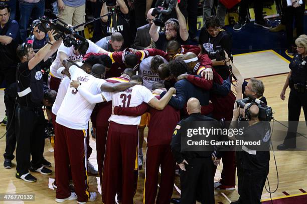 The Cleveland Cavaliers huddle before a game against the Golden State Warriors in Game Four of the 2015 NBA Finals on June 11, 2015 at Quicken Loans...