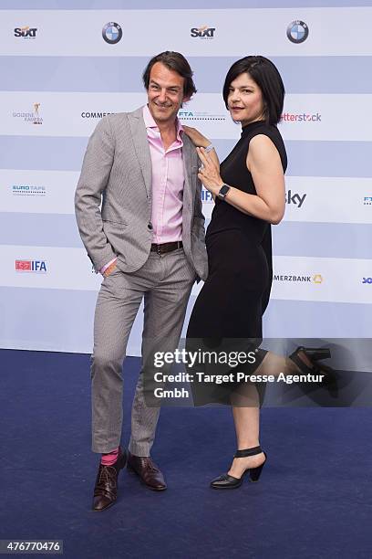 Hans Werner Meyer and Jasmin Tabatabai attend the producer party 2015 of the Alliance German Producer - Cinema And Television on June 11, 2015 in...