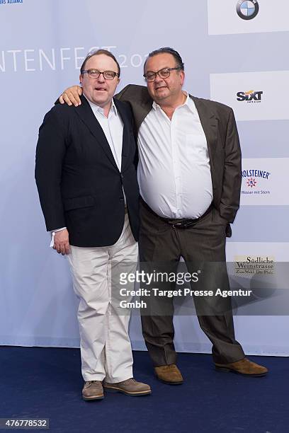 Gustav Peter Woehler and his partner Albert Wiederspiel attend the producer party 2015 of the Alliance German Producer - Cinema And Television on...