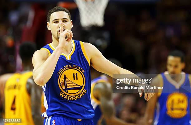 Klay Thompson of the Golden State Warriors reacts in the fourth quarter against the Cleveland Cavaliers during Game Four of the 2015 NBA Finals at...