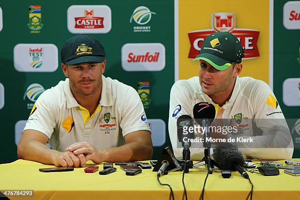David Warner and Michael Clarke of Australia speaks during a press conference after day 5 of the third test match between South Africa and Australia...