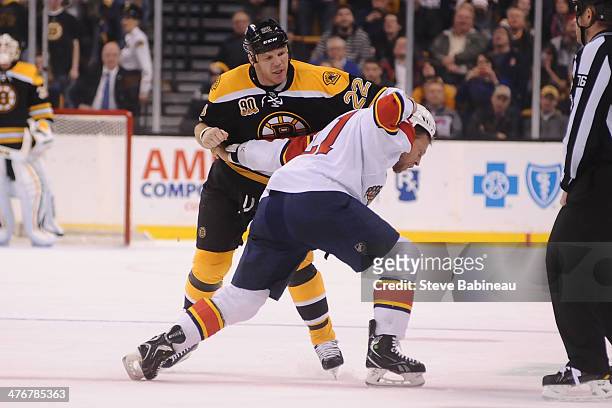 Shawn Thornton of the Boston Bruins fights against Krys Barch of the Florida Panthers at the TD Garden on March 4, 2014 in Boston, Massachusetts.