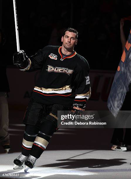 Francois Beauchemin of the Anaheim Ducks acknowledges the fans after the Ducks' 5-3 win over the Carolina Hurricanes on March 2, 2014 at Honda Center...