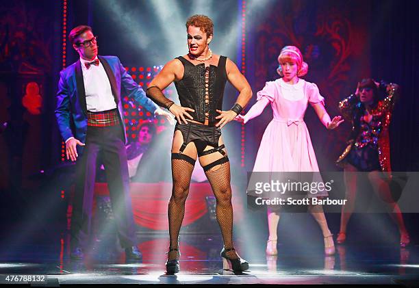 Amy Lehpamer as Janet, Stephen Mahy as Brad and Craig McLachlan as Frank N Furter perform during a "Rocky Horror Show" Media Call at the Comedy...