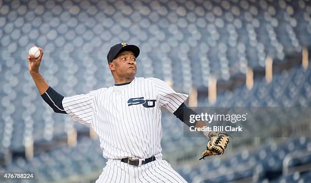 Rep. Cedric Richmond, D-La., pitches during the 54th Annual Roll Call Congressional Baseball Game at Nationals Park in Washington on Thursday, June...